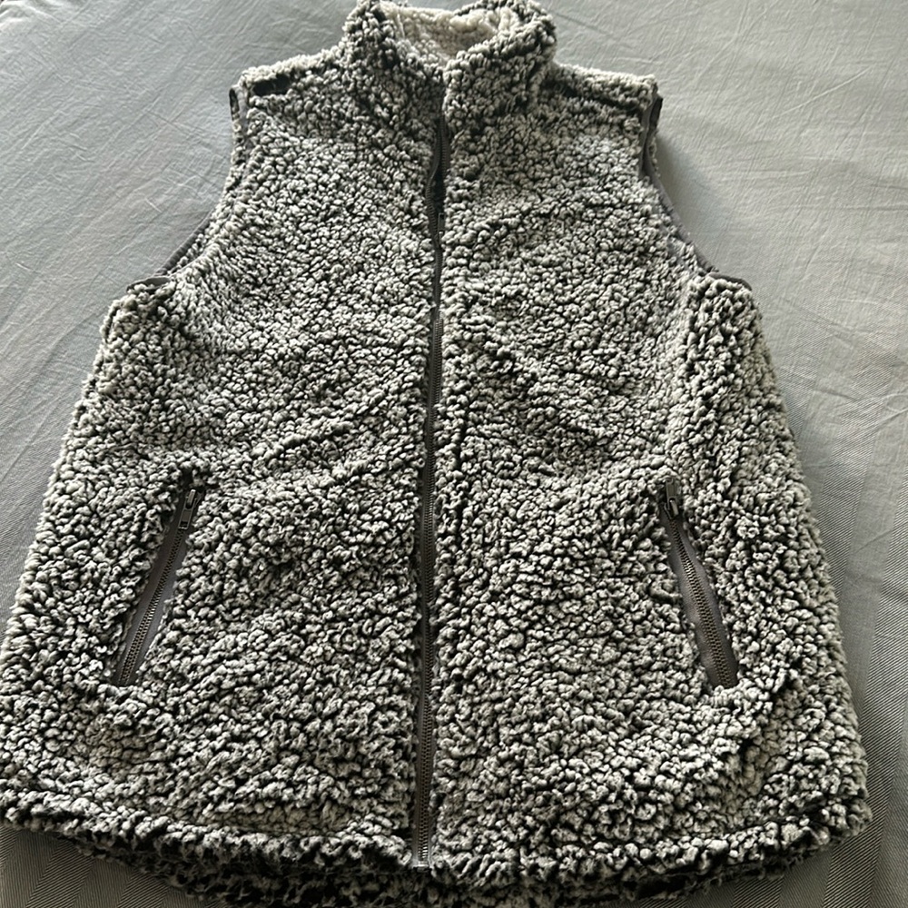 Gray vest size large.  Gently worn.